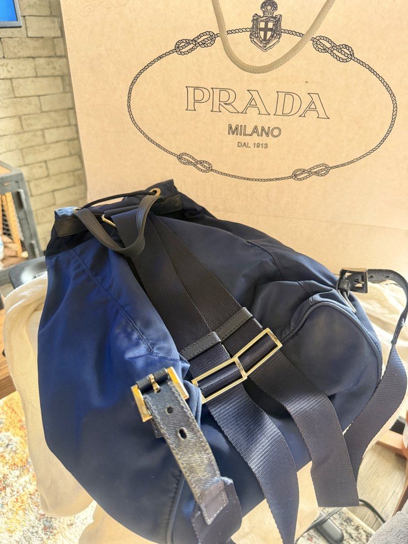 Prada Backpack Nylon - Blue (Category: Luxury Bags & Wallets) located in Pasig City. Submitted by ryanlim1515 (Listing ID 1466003519, Image 3). Description: ORIGINAL PRADA Nylon Backpack – Blue 💙 ✨ Lightly used Brand: Prada Item: Nylon Backpack Color: Blue Material: Nylon Condition: Like new Size: Medium size Authenticity: Guaranteed authentic Inclusions: [Dust bag / Paper bag] Details * Classic and timeless Prada nylon backpack * Lightweight an