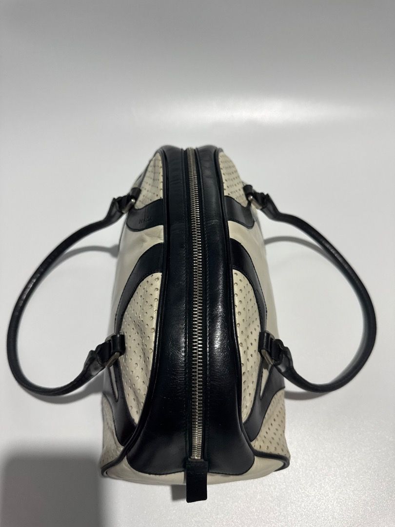 Prada Leather Bowling Bag (Category: Luxury Bags & Wallets) located in Las Pinas. Submitted by coluxxexprelovedstreet1828 (Listing ID 1466140267, Image 3). Description: Authentic Prada Bowling Bag Rank AB Signs of use on the body Guaranteed authentic Negotiable Detailed pics available upon request No to meet up Courier j&t, LBC (by schedule) Lalamove/grab around metromanila SF shoulder by buyer .
