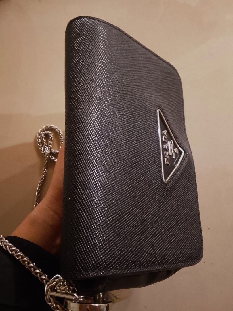 Preloved Auth. Prada Identity Logo Plaque Shoulder Bag S (Category: Luxury Bags & Wallets) located in Alicia. Submitted by celynahambotruecelyna39 (Listing ID 1466095149, Image 3). Description: In good condition,issue sling replacement.