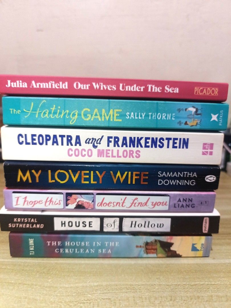 Books for sale! (Category: Storybooks) located in Pasig City. Submitted by sukiyakixo (Listing ID 1465976211, Image 1). Description: - All books are read once and almost new. - Titles included: Our Wives Under The Sea php 500 The Hating Game php 400 Cleopatra and Frankenstein php 500 My Lovely Wife php 300 I Hope This Doesn't Find You php500 House of Hollow php 500 The House in the Cerulean Sea sold - Condition: Pages show natural yellowing and f