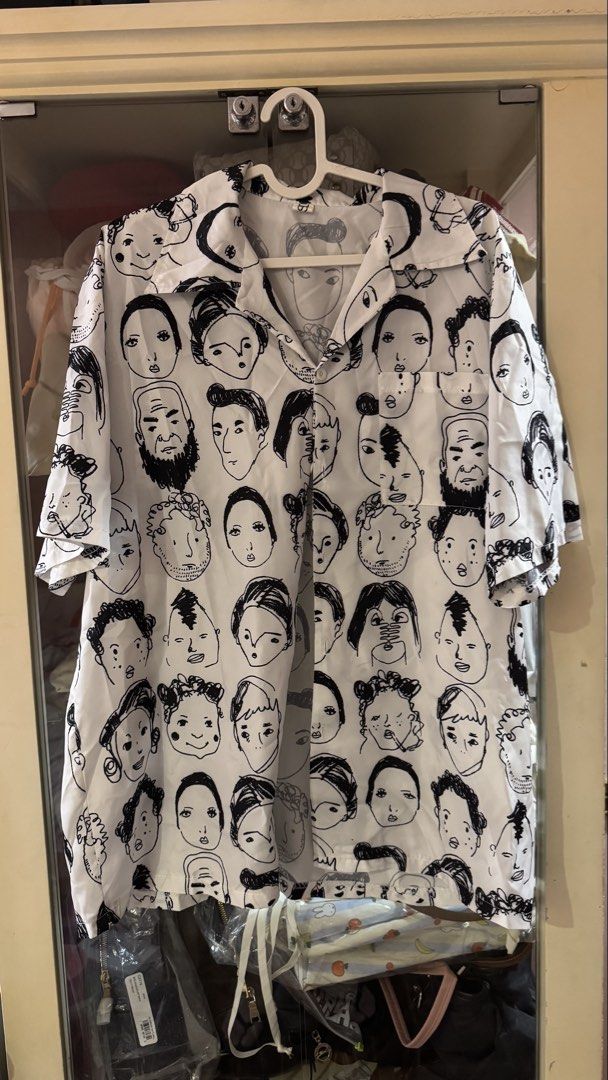 Printed short sleeve button down shirt (Category: Shirts) located in Manila. Submitted by harleyy1230 (Listing ID 1466058833, Image 1). Description: Oversized fit.
