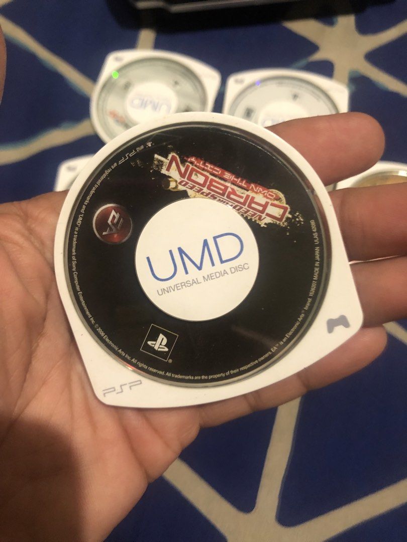 PSP Umd Discs lot set with hard case (Category: PlayStation) located in Quezon City. Submitted by markgolveo (Listing ID 1466057711, Image 3). Description: PSP Umd Discs lot set with hard case 7 pcs ntsc US umds With multi slot hard case Issue on the the hardcase lock latch broken but still can be used to hold the umd discs inside.