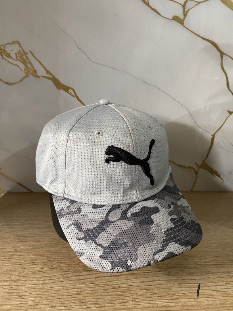PUMA CAMOU BIG LOGO FITTED CAP (Category: Caps & Hats) located in Talisay. Submitted by hustlethrift_2600 (Listing ID 1466077043, Image 1). Description: L-XL ON TAG VERY GOOD CONDITION SIGN OF USAGE 9.8/10 COLOR RATE.