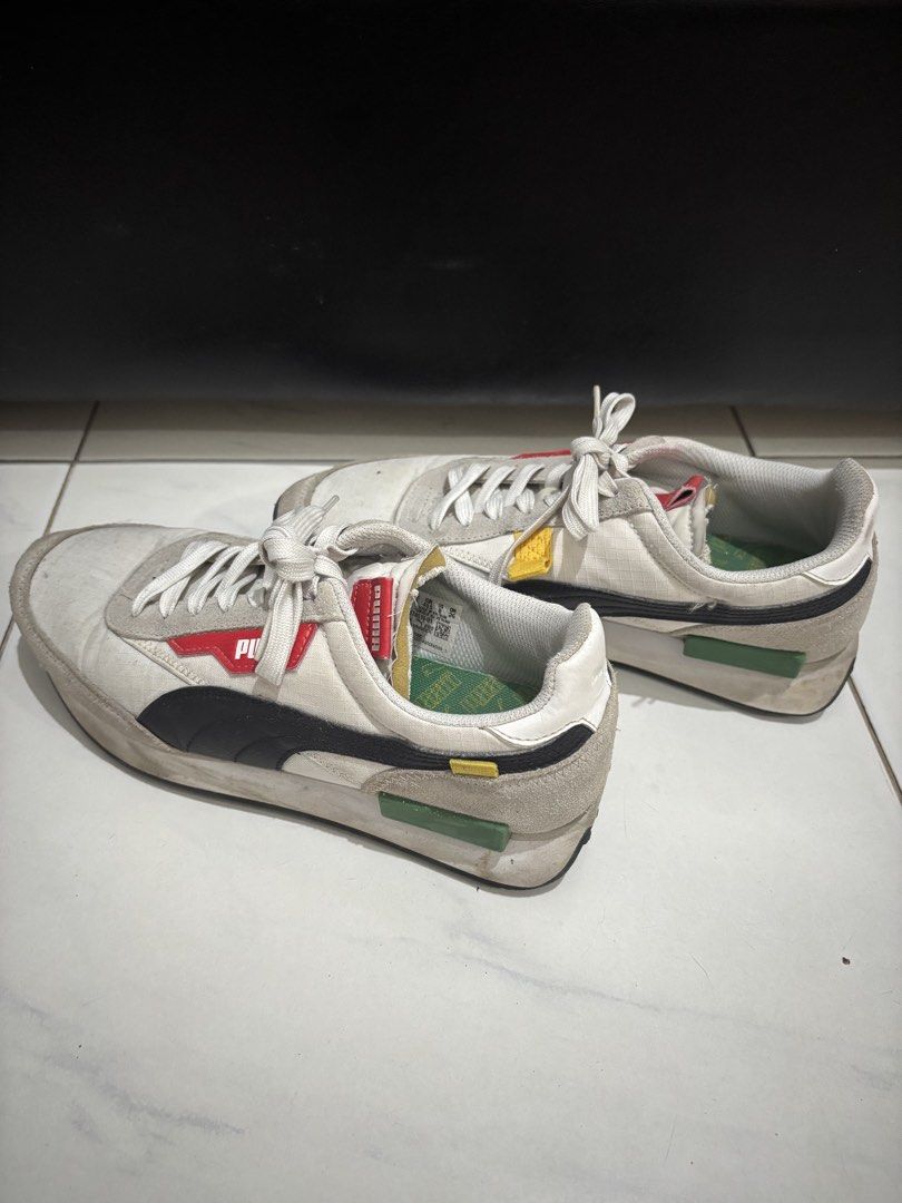 Puma Future Rider Play On White Red Green (Category: Sneakers) located in Cavite. Submitted by 1renek (Listing ID 1466099595, Image 2). Description: - Brand/Model: Puma Future Rider - Colorway: White canvas with grey suede, black formstrip, red/yellow accents, and green midsole block - Size: UK 7 / EUR 40.5 / US 8 / CM 26 - Origin: Made in Vietnam - Condition: Normal signs of wear on soles and uppers, still super comfortable and great for daily w