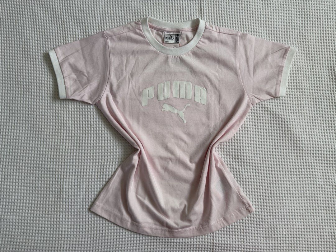 Puma Pink Graphic Ringer Tee (Category: Shirts) located in Baguio. Submitted by blnxxx (Listing ID 1466096199, Image 2). Description: Puma Light pink with white contrast ribbing Medium Brand new.