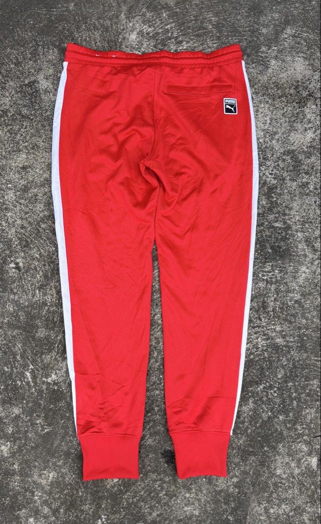 Puma Red Track Pants XXL White Side Stripes (Category: Joggers) located in Naga. Submitted by ajrc.shop (Listing ID 1466094924, Image 2). Description: PUMA Iconic T7 Track Pants ✅Size: 2XL ✅Width: 36-40 ✅Length: 40.5 ✅Color Rate: 9.8/10 ✅Issue: None ✅Need Wash ✅Location: Bicol Naga City, Camarines Sur ✅Courier: J&T Express/Flash Express ✅MOP: Gcash only.
