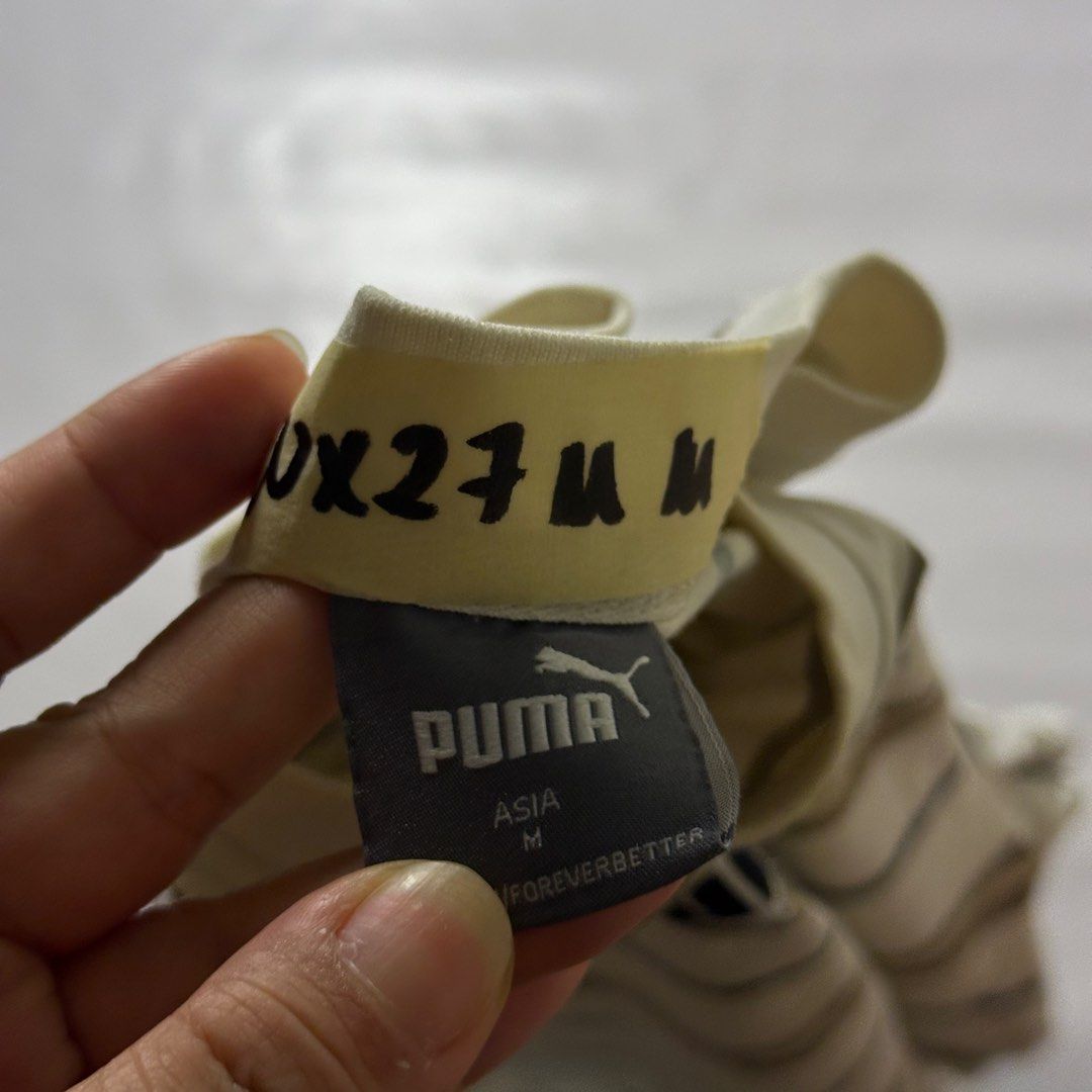 Puma Striped T-Shirt (Category: Tshirts & Polo Shirts ) located in Gapan. Submitted by rasthriftshop (Listing ID 1466123102, Image 3). Description: PUMA Size on tag: M Dimes: 20 x 27 ₱350 + sf Condition: Excellent Color rate: 9/10 Issue: None.