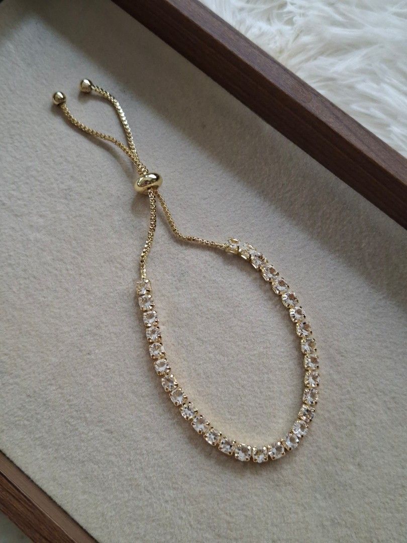 Push and Pull Square Stones Drawstring Zirconia Gold Stainless Bracelet (Category: Bracelets) located in Dasmarinas. Submitted by danabrie22 (Listing ID 1466030829, Image 1). Description: very well-made, excellent crafstmanship 10/10 condition brand new zinc alloy & white-colored cubic zirconia stones made in Hongkong.