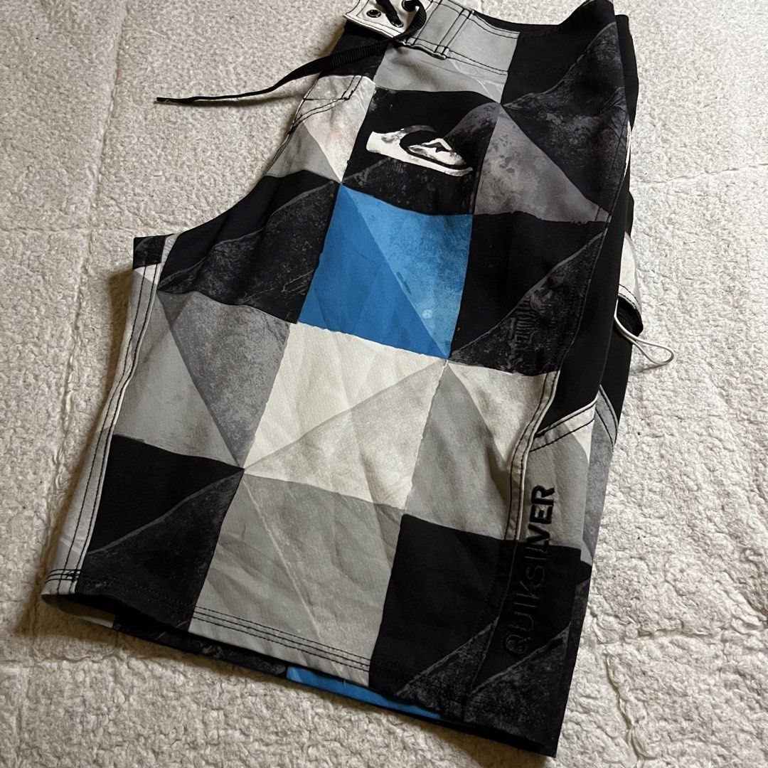 Quicksilver boardshorts (Category: Swim Trunks & Board Shorts) located in Coron. Submitted by tr1p2thr1ft (Listing ID 1465976488, Image 3). Description: Length 21 Waist 32 Hem 11 No issue As new condition Juan Miguel Mondejar(fb acc).