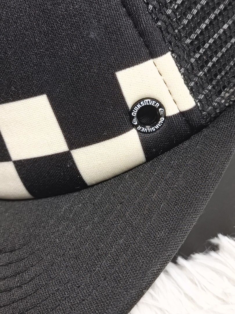 Quiksilver Checkered Trucker Hat Black White (Category: Caps & Hats) located in Imus. Submitted by grindhouse.thriftshop (Listing ID 1466122886, Image 3). Description: - Brand: Quiksilver - Design: Black and white checkerboard foam front with embroidered logo patch - Ventilation: Breathable black mesh back/sides and front eyelets - Brim: Flat brim design - Closure: Adjustable plastic snapback with brand tab - Condition: Excellent / Ready to wear 