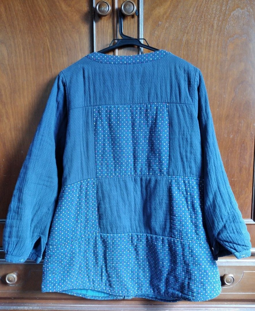 Quilted Cotton Patchwork Jacket Blue Polka Dot (Category: Coats, Jackets and Outerwear) located in Baguio. Submitted by tipiditis (Listing ID 1466032999, Image 2). Description: - Style: Blue quilted jacket with multi-colored polka dot patchwork details - Closure & Cuffs: Button-down front and long sleeves with button cuffs - Design: Round collar and convenient front pockets - Material: Textured cotton with soft padding inside for warmth - Fit: Co