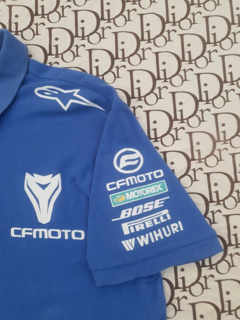Racing polo shirt CF Moto (Category: Tshirts & Polo Shirts ) located in San Fernando. Submitted by retro.district. (Listing ID 1466084719, Image 3). Description: - CF Moto Racing poloshirt - Size: Large (23x28) - Condition: Excellent - No issue - Color Rate: 9.5/10.