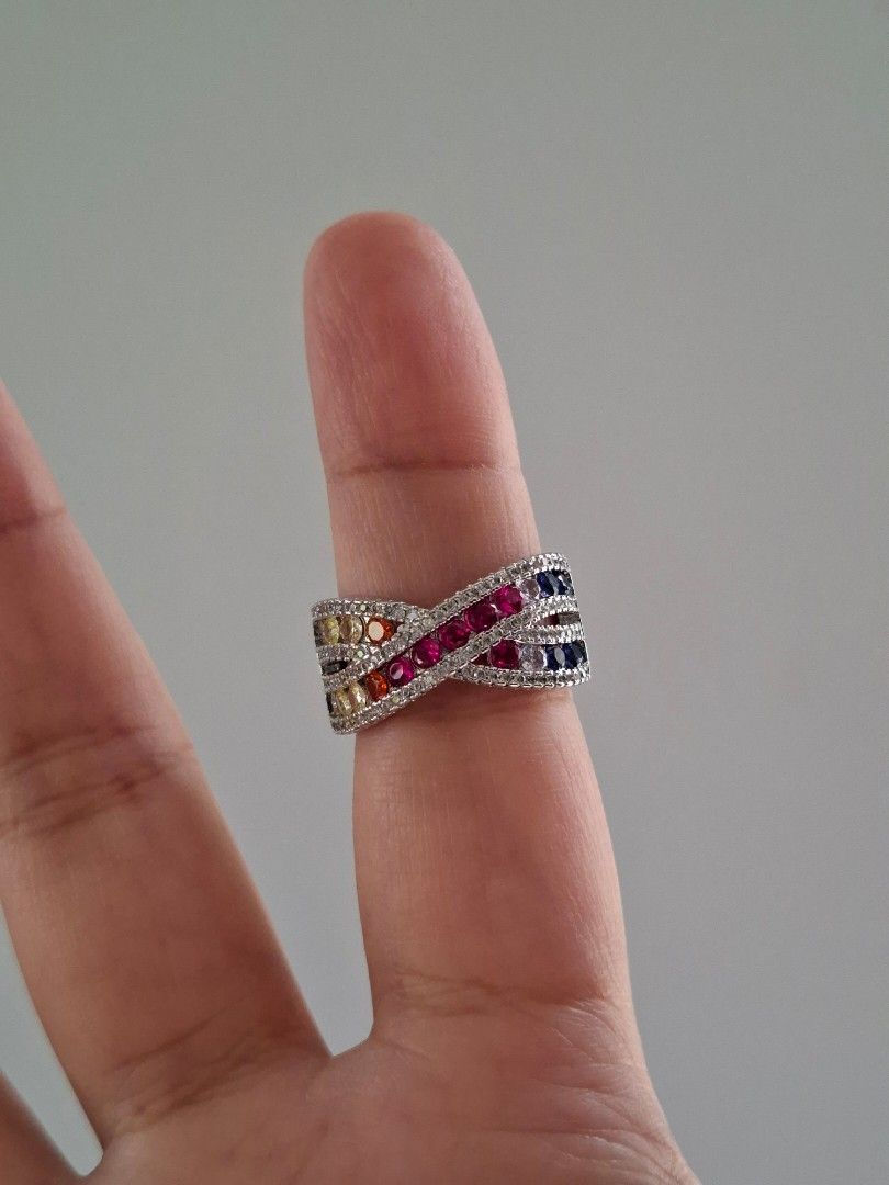 Rainbow Multicolor Stones Cross Design Silver Size 8 Ring (Category: Rings) located in Dasmarinas. Submitted by danabrie22 (Listing ID 1466030234, Image 1). Description: size 8 very well-made, excellent crafstmanship 10/10 condition brand new stainless steel & multi-colored cubic zirconia stones made in Hongkong.