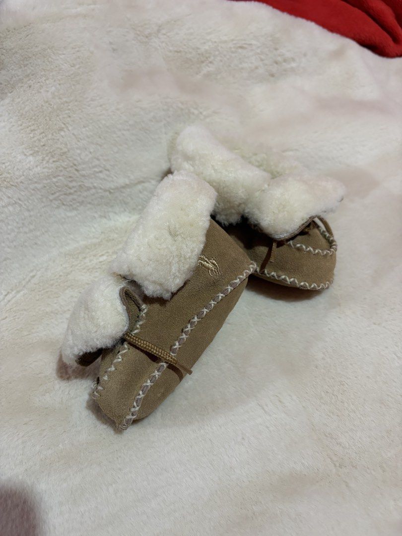 Ralph Lauren Baby Suede Shearling Booties (Category: Babies & Kids Fashion) located in Manila. Submitted by kindledph_ (Listing ID 1466023509, Image 1). Description: RFS: Decluttering - Authentic Ralph Lauren baby booties - Premium brown suede material with soft white faux shearling lining - Adorable lace-up bow detail on top - Signature embroidered logo on the side - Suede sole with embossed logo lettering - Keeps tiny feet warm, cozy, and styli