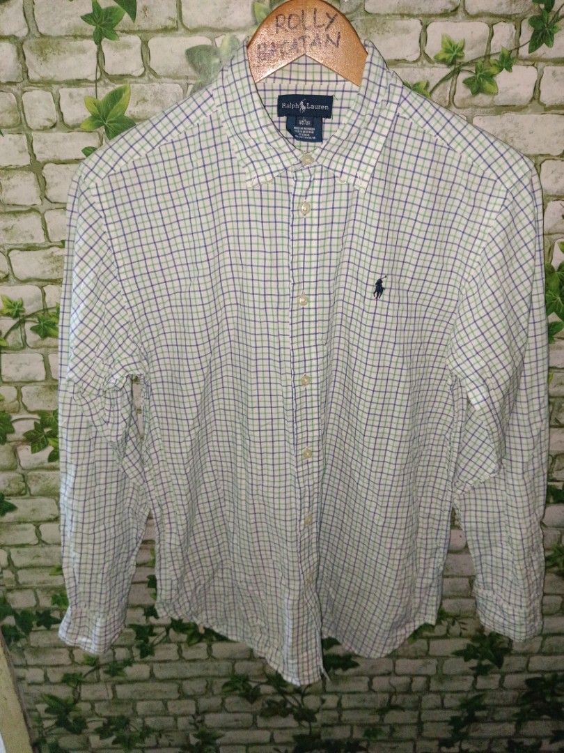 Ralph Lauren Checked Button-Down Long Sleeve Shirt Size L (Category: Formal Shirts) located in Carcar. Submitted by rolandobac92675 (Listing ID 1465983415, Image 3). Description: - Brand: Ralph Lauren - Size: L - Color/Pattern: White with green and blue check - Material: 100% Cotton - Fit: Regular fit with curved hem and button-down collar - Details: Signature embroidered pony logo on chest - Condition: Clean, excellent, and ready to wear.