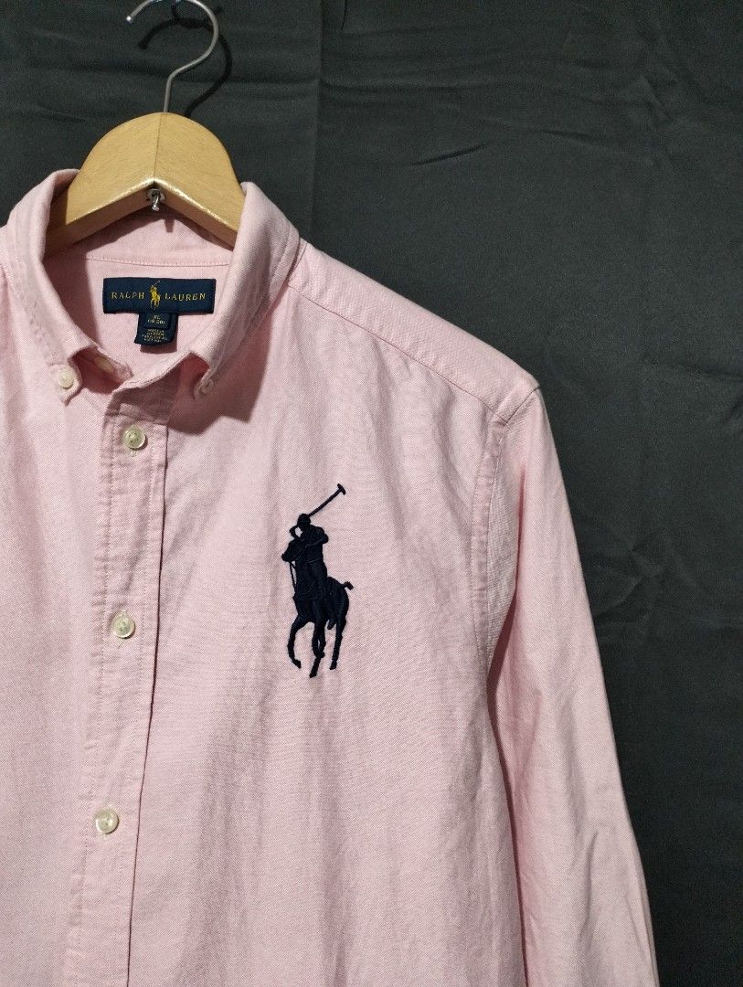 Ralph Lauren Pink Buttondown (Category: Formal Shirts) located in Lapu Lapu. Submitted by kalyengkalat01 (Listing ID 1466046850, Image 2). Description: Ralph Lauren Pink Buttondown For Men — Classic Fit , Oxford Cotton Size : XL 18-20 Youth ( Fit To Medium Adult ) Dimes : 20.5 Width 28 Length Color rate : 9.8 out of 10 —————————— Authentic | Legit 💯 Condition : Like New / Excellent ‼️ ISSUE : Dot Stain ( Seen on Last Pic ) 🚶‍♂️ Washed & Ready t