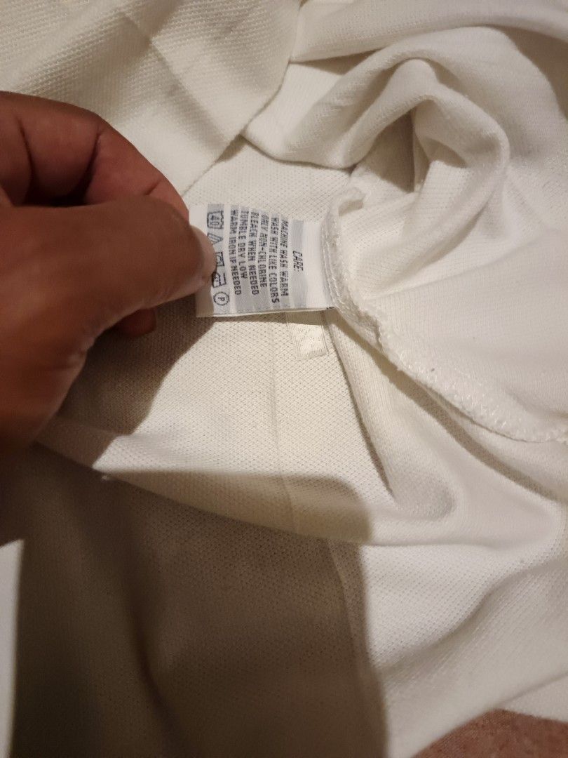 Ralph Lauren polo shirt (Category: Activewear) located in Odiongan. Submitted by thriftngo26 (Listing ID 1466069655, Image 3). Description: Ralph Lauren White polo shirt for women.