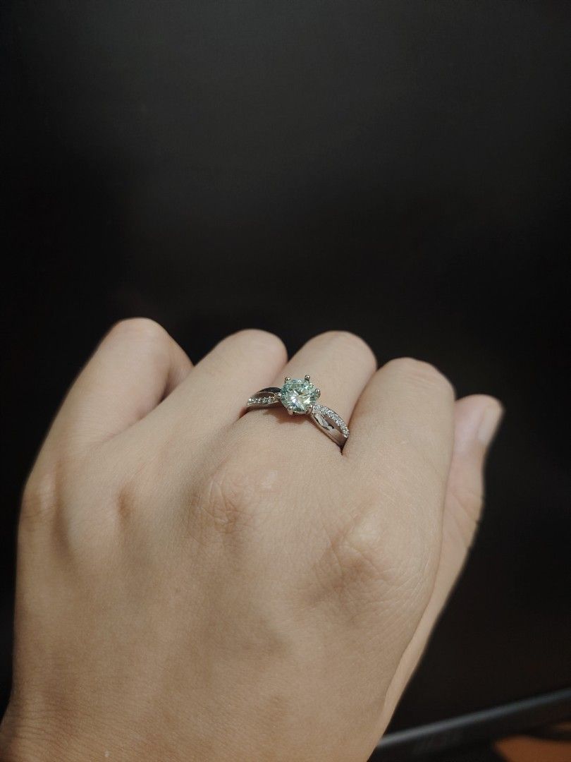 Moissanite Bluish colored ring (Category: Rings) located in Caloocan City. Submitted by cherishedfinds (Listing ID 1466113762, Image 1). Description: - Tested Moissanite ring (pass diamond tester) - Adjustable - 18K White Gold plated, non tarnish non fade under proper care - Perfect for dummy engagement/wedding ring - Spend 500, get a freebie 🎁 You may add items from my other listings 💯.