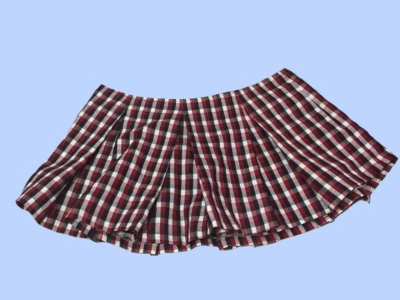 Red Black White Plaid Pleated Skirt (Category: Skirts) located in Manila. Submitted by joclutter (Listing ID 1466077195, Image 1). Description: - Color: Red, black, and white plaid - Style: Pleated all around with a flare cut - Closure: Back zip - Length: Short - Material: Lightweight and comfortable fabric - Vibe: Perfect for casual fits and streetwear.