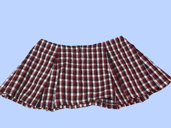 Red Black White Plaid Pleated Skirt (Category: Skirts) located in Manila. Submitted by joclutter (Listing ID 1466077195, Image 2). Description: - Color: Red, black, and white plaid - Style: Pleated all around with a flare cut - Closure: Back zip - Length: Short - Material: Lightweight and comfortable fabric - Vibe: Perfect for casual fits and streetwear.