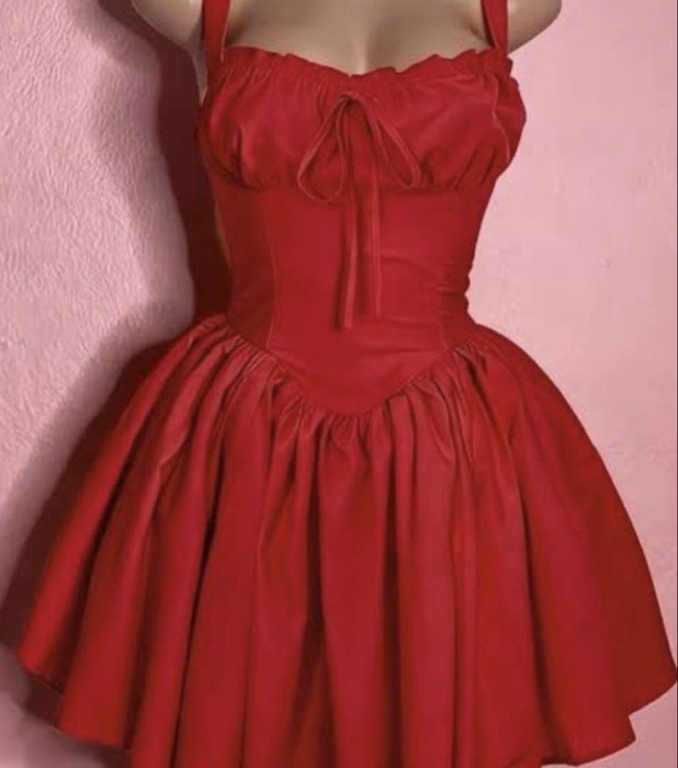 Red Corset Style Mini Dress (Category: Dresses) located in Manila. Submitted by ulan_9 (Listing ID 1465961246, Image 1). Description: - Color: Bright red - Style: Corset bodice with structured paneling, front tie detail, and flared skater skirt - Straps: Shoulder straps included - Condition: Worn a couple of times for photos, still in great shape - Best for: Parties, clubbing, and nights out.