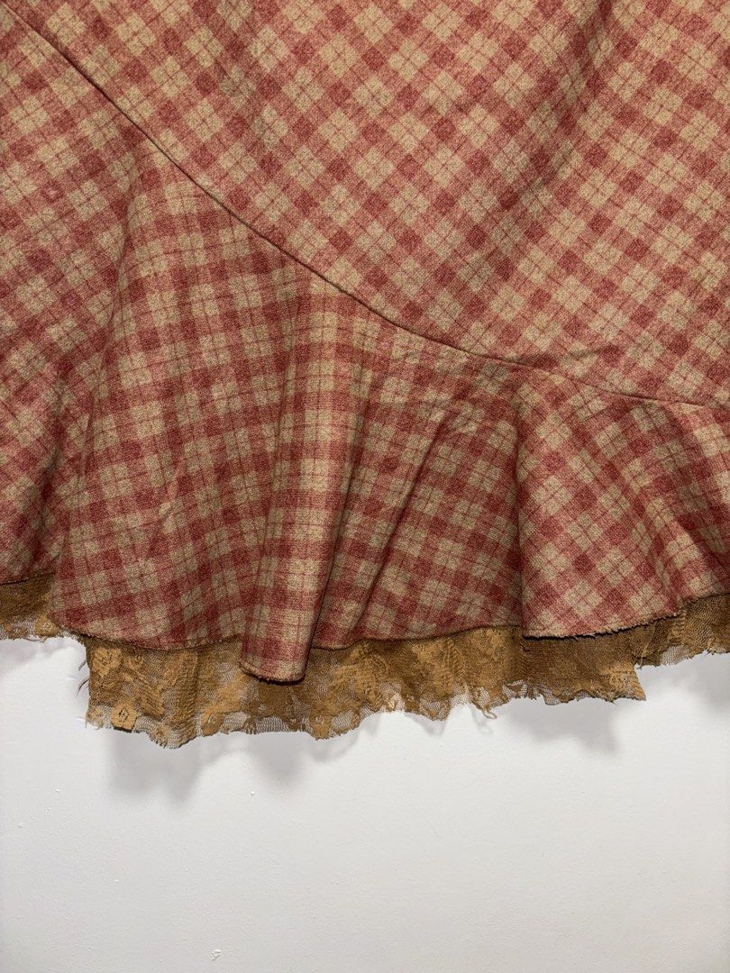 Red Plaid Midi Skirt with Lace (Category: Skirts) located in San Mateo. Submitted by guddaze (Listing ID 1466148111, Image 3). Description: Waist - 27" Length - 26" With inner lining, with zipper on the side For reference, I'm 5"5, 58kg, 28 inch waistline 🚚 Shipping can be done via J&T Express/Lalamove, and the shipping fee will be shouldered by the buyer. 📍 Location: San Mateo, Rizal 🏦 Mode of payment: GCash/Maya/Maribank.