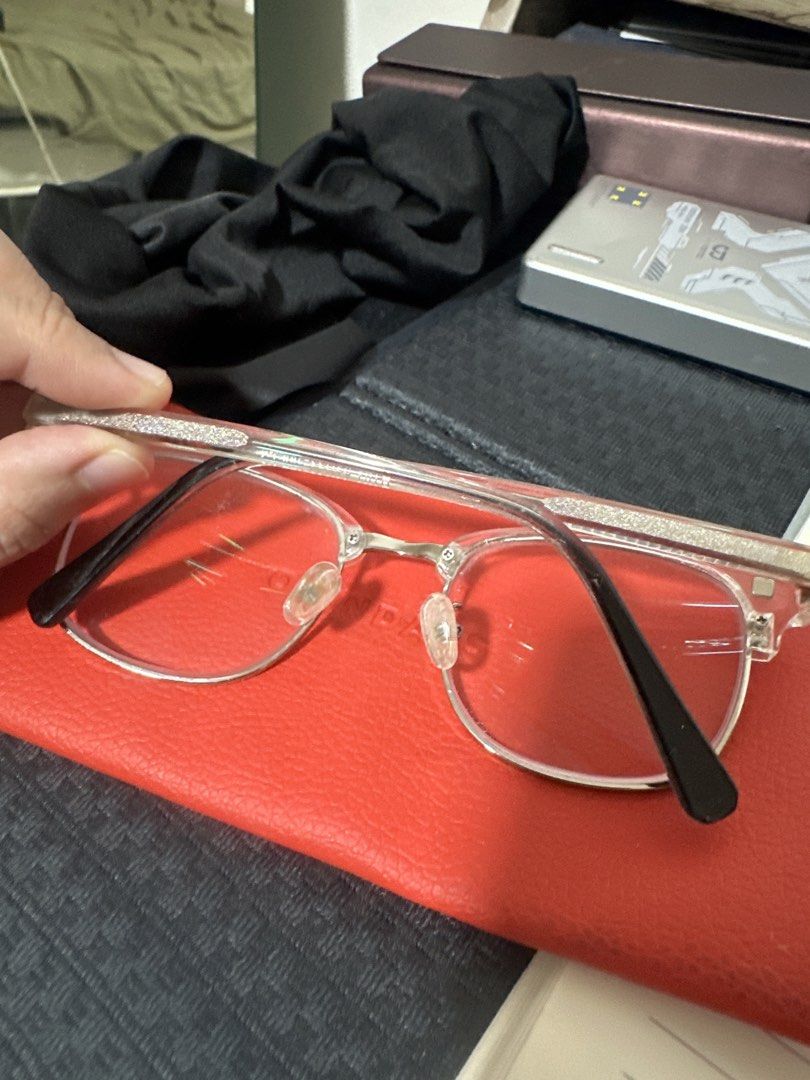 RETRA x OJO transparent eyeglasses (Category: Sunglasses & Eyewear) located in Quezon City. Submitted by camille96 (Listing ID 1465961899, Image 2). Description: - Brand: RETRA x OJO collaboration - Frame: Clear acetate with silver metal bridge and details - Temples: Black tips, lightweight and comfortable for everyday wear - Graded lenses.