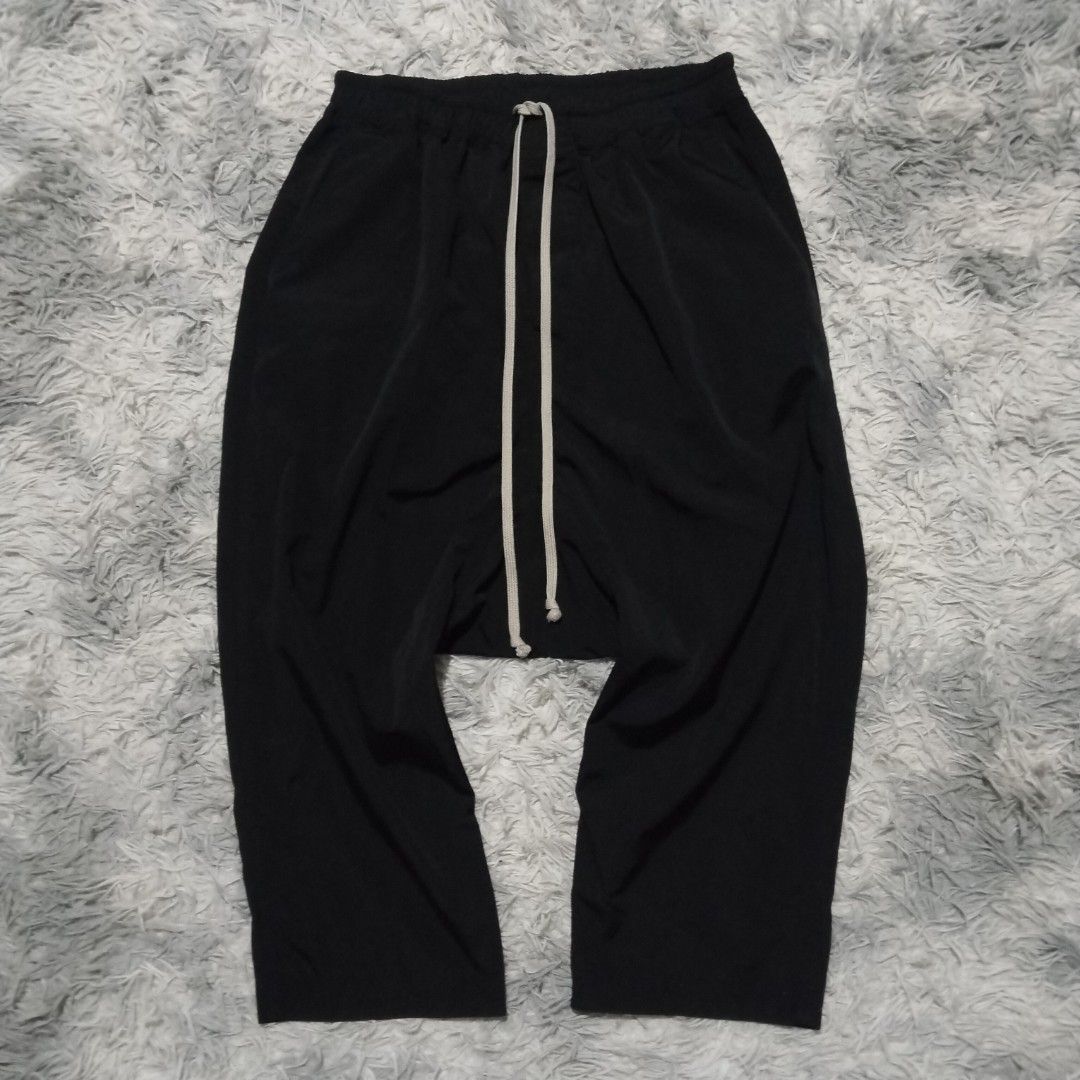 RICK OWENS DS DROP CROTCH (Category: Trousers) located in Dasmarinas. Submitted by oneofakind_98 (Listing ID 1466118213, Image 1). Description: RICK OWENS DS Drop Crotch - Like new condition - Strechable waistline Measurement when Iaid flat Size XL on tag 14 inches strech up to 19 inches waistline 33 inches length 33 inches outseam 20 inches inseam 13.5 inches front rise 11 inches thigh 12 inches thigh 8 inches leg opening 2800 shipped via JNT.