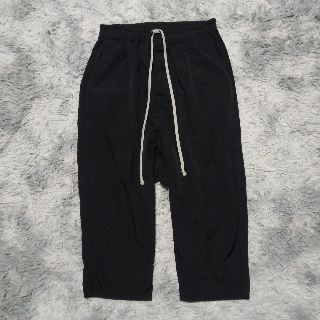 RICK OWENS DS DROP CROTCH (Category: Trousers) located in Dasmarinas. Submitted by oneofakind_98 (Listing ID 1466118213, Image 3). Description: RICK OWENS DS Drop Crotch - Like new condition - Strechable waistline Measurement when Iaid flat Size XL on tag 14 inches strech up to 19 inches waistline 33 inches length 33 inches outseam 20 inches inseam 13.5 inches front rise 11 inches thigh 12 inches thigh 8 inches leg opening 2800 shipped via JNT.