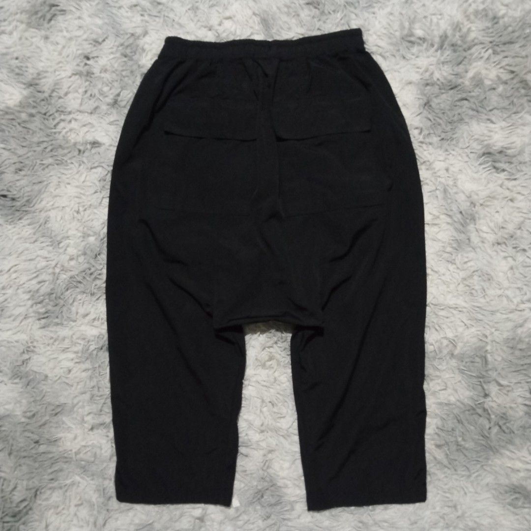 RICK OWENS DS DROP CROTCH (Category: Trousers) located in Dasmarinas. Submitted by oneofakind_98 (Listing ID 1466118213, Image 2). Description: RICK OWENS DS Drop Crotch - Like new condition - Strechable waistline Measurement when Iaid flat Size XL on tag 14 inches strech up to 19 inches waistline 33 inches length 33 inches outseam 20 inches inseam 13.5 inches front rise 11 inches thigh 12 inches thigh 8 inches leg opening 2800 shipped via JNT.