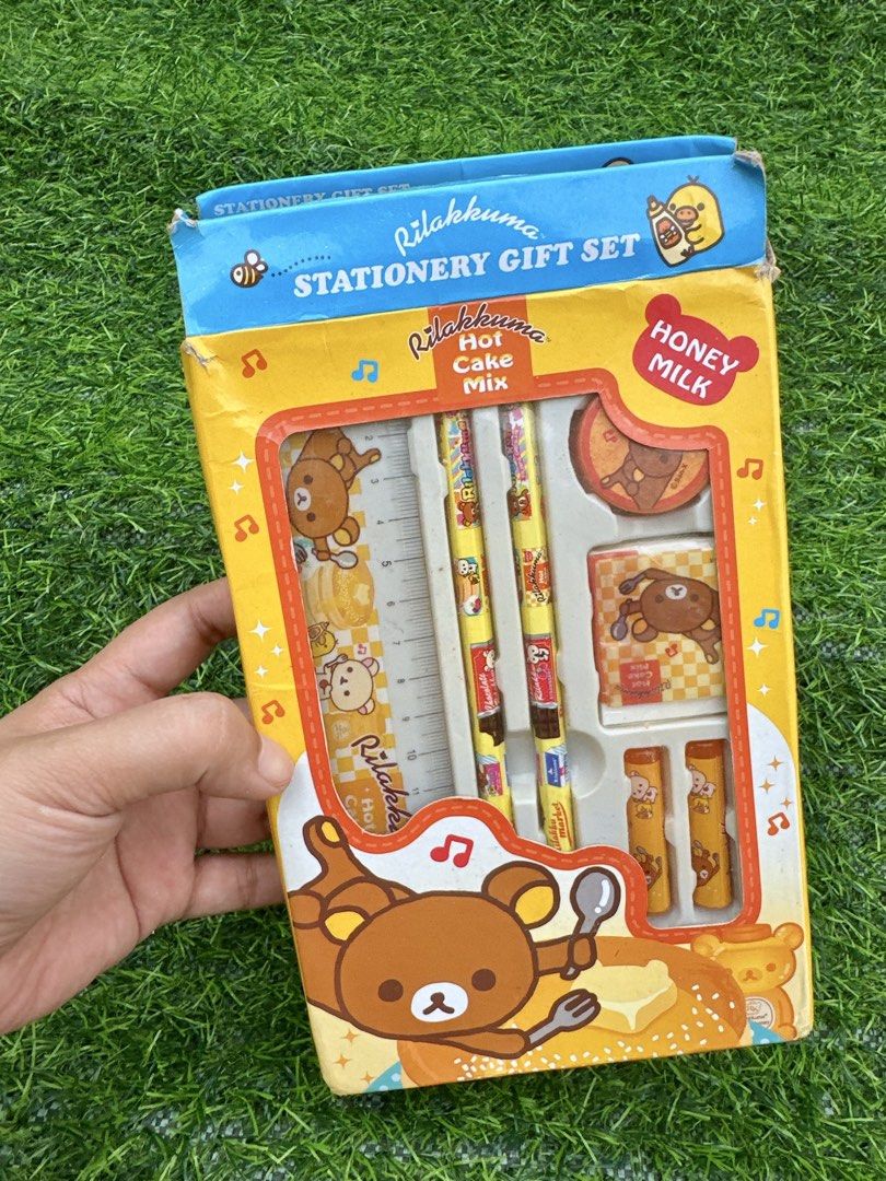 Rilakkuma Hot Cake Mix Stationery Gift Set (Category: Stationery & School Supplies) located in Manila. Submitted by ronoarabbit.ph (Listing ID 1466048896, Image 3). Description: ‼️Ngarag na ung box, bawal sa maarte‼️ - Theme: Rilakkuma Honey Milk Pancake - Colorway: Yellow, orange, and brown - Inclusions: 2 pencils, 1 ruler, 2 small caps, 1 eraser, and 1 circular stamp - Packaging: Comes in original box with plastic tray - Ideal for: Gifts, schoo