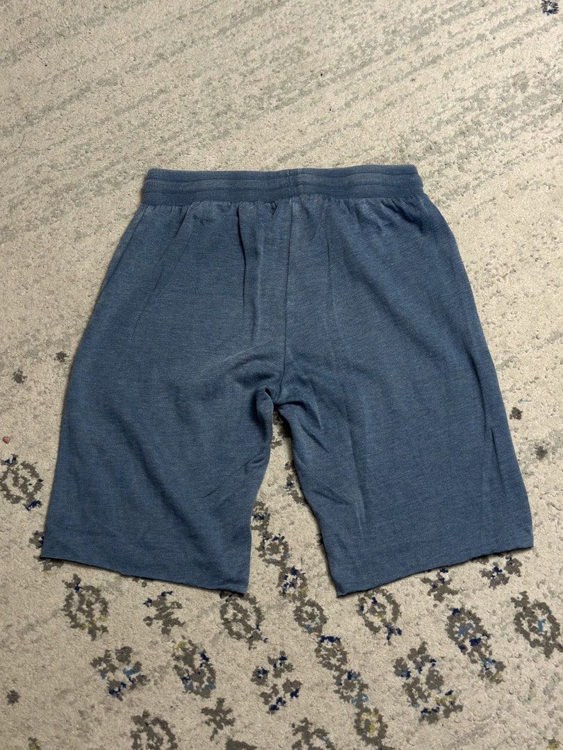 Rip Curl Blue Sweatshorts Size S (Category: Shorts) located in Daet. Submitted by thrifthings2018 (Listing ID 1466047546, Image 3). Description: - Brand: Rip Curl - Color/Style: Blue fleece shorts with colorful gradient logo print - Waist: Fits 29-32 inches (elastic drawstring waistband) - Length: 20 inches - Details: Raw-hem leg openings - Size: Small.