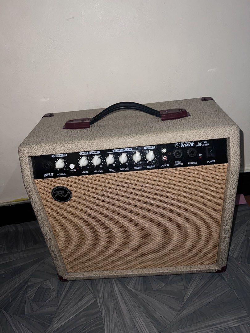 RJ Sound Wave Guitar Amplifier (Category: Musical Instruments) located in Bacoor. Submitted by rskab_26 (Listing ID 1466099504, Image 1). Description: Title: RJ Soundwave Electric Guitar Combo Amplifier (Tweed Style) Price: ₱4,500 (Negotiable) Description: Selling my RJ Soundwave electric guitar combo amplifier in classic beige/tweed casing. Great versatile practice amp for home practice, jam sessions, or small gigs! Key Specs & Features: Power O