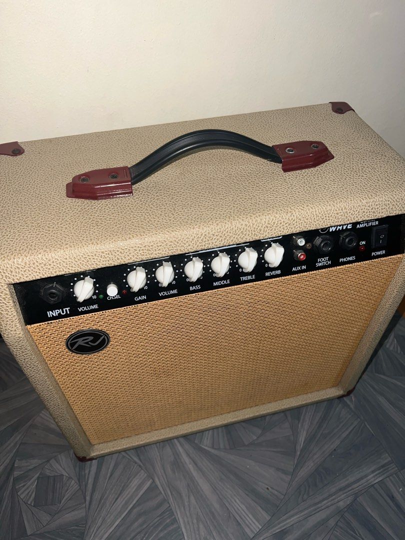 RJ Sound Wave Guitar Amplifier (Category: Musical Instruments) located in Bacoor. Submitted by rskab_26 (Listing ID 1466099504, Image 3). Description: Title: RJ Soundwave Electric Guitar Combo Amplifier (Tweed Style) Price: ₱4,500 (Negotiable) Description: Selling my RJ Soundwave electric guitar combo amplifier in classic beige/tweed casing. Great versatile practice amp for home practice, jam sessions, or small gigs! Key Specs & Features: Power O