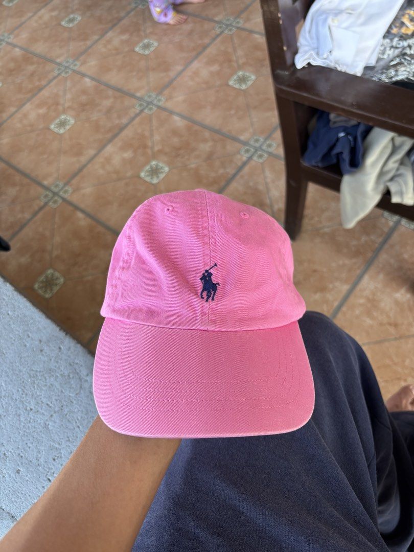Rl cap (Category: Activewear) located in San Fernando. Submitted by diff.thr1ft (Listing ID 1465996659, Image 1). Description: - Brand: Polo by Ralph Lauren - Color: Bright Pink - Condition: Excellent / Well-maintained - Material: 100% Cotton - Size: One Size Only (Adjustable) - Features: Classic embroidered pony logo on front, inner brand tag intact.
