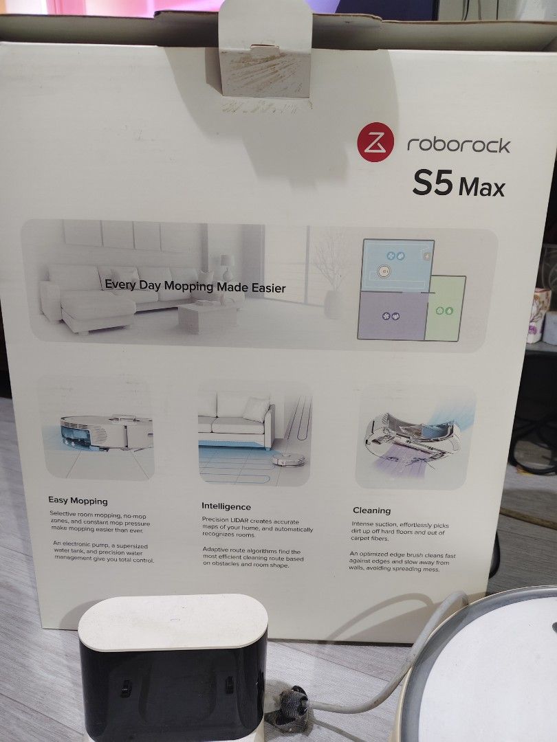 Roborock S5 Max Robot Vacuum Cleaner (Category: Vacuum Cleaner & Housekeeping) located in Manila. Submitted by paulaceejay14 (Listing ID 1465965146, Image 2). Description: - Model: Roborock S5 Max Robot Vacuum and Mop (White) - Condition: Excellent, comes with original box featuring the CES 2020 Innovation Award badge - Included: Charging dock, power cable, and original packaging - Key Features: Advanced Laser Distance Sensor (LDS) for mapping, p