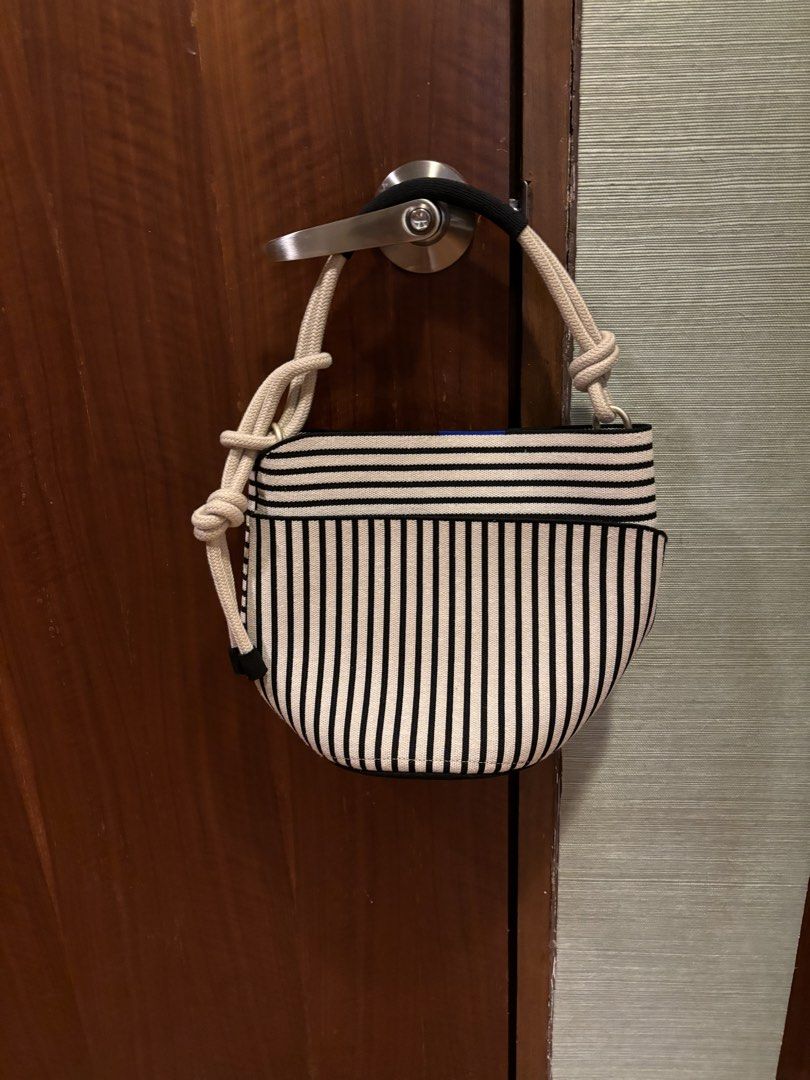 Rothy's Black & White Striped Bag (Category: Tote Bags) located in Muntinlupa City. Submitted by juliegarcia (Listing ID 1466040872, Image 1). Description: ✨ Great quality; used & loved! 🚢 Shipping fee not included. 💸 Price negotiable. 💌 DM for more photos & info. 🍒 RSF: Cleaning out my closet! .