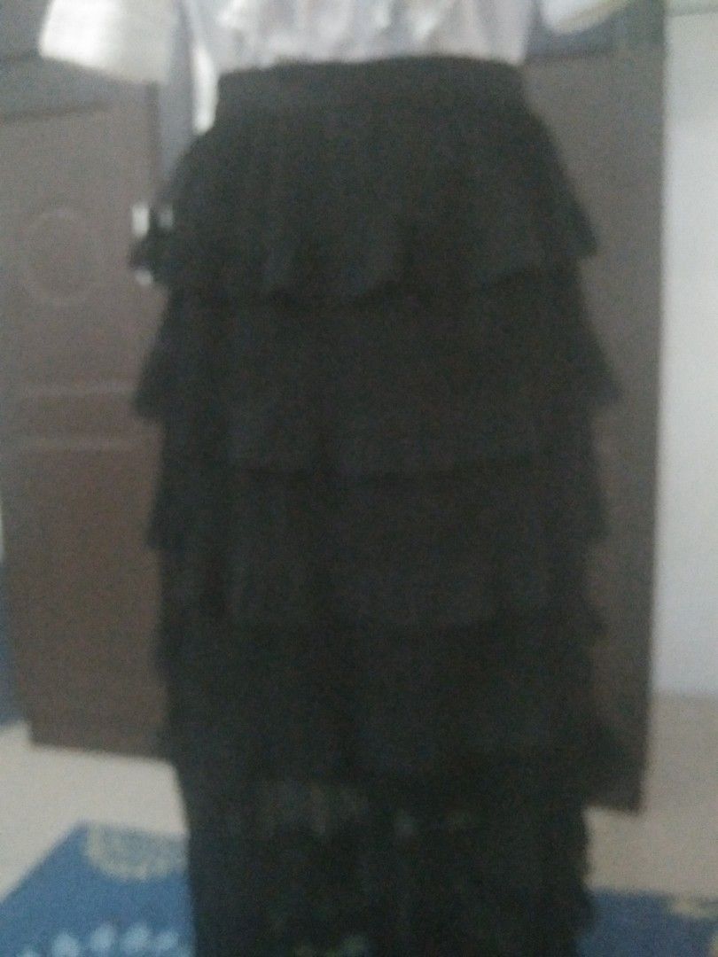 Ruffled long skirt (Category: Skirts) located in San Fernando. Submitted by kitkat.astina (Listing ID 1465964254, Image 3). Description: waist garterized can fit 27-29 inches length 37 inches black not used.