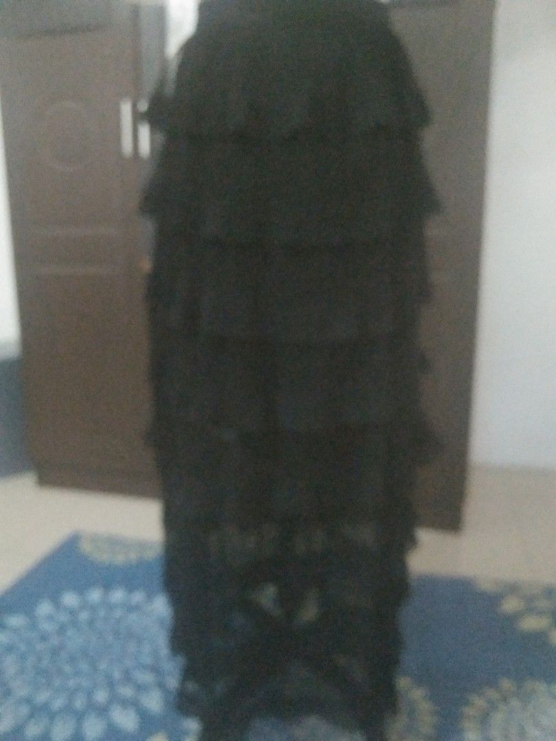 Ruffled long skirt (Category: Skirts) located in San Fernando. Submitted by kitkat.astina (Listing ID 1465964254, Image 1). Description: waist garterized can fit 27-29 inches length 37 inches black not used.