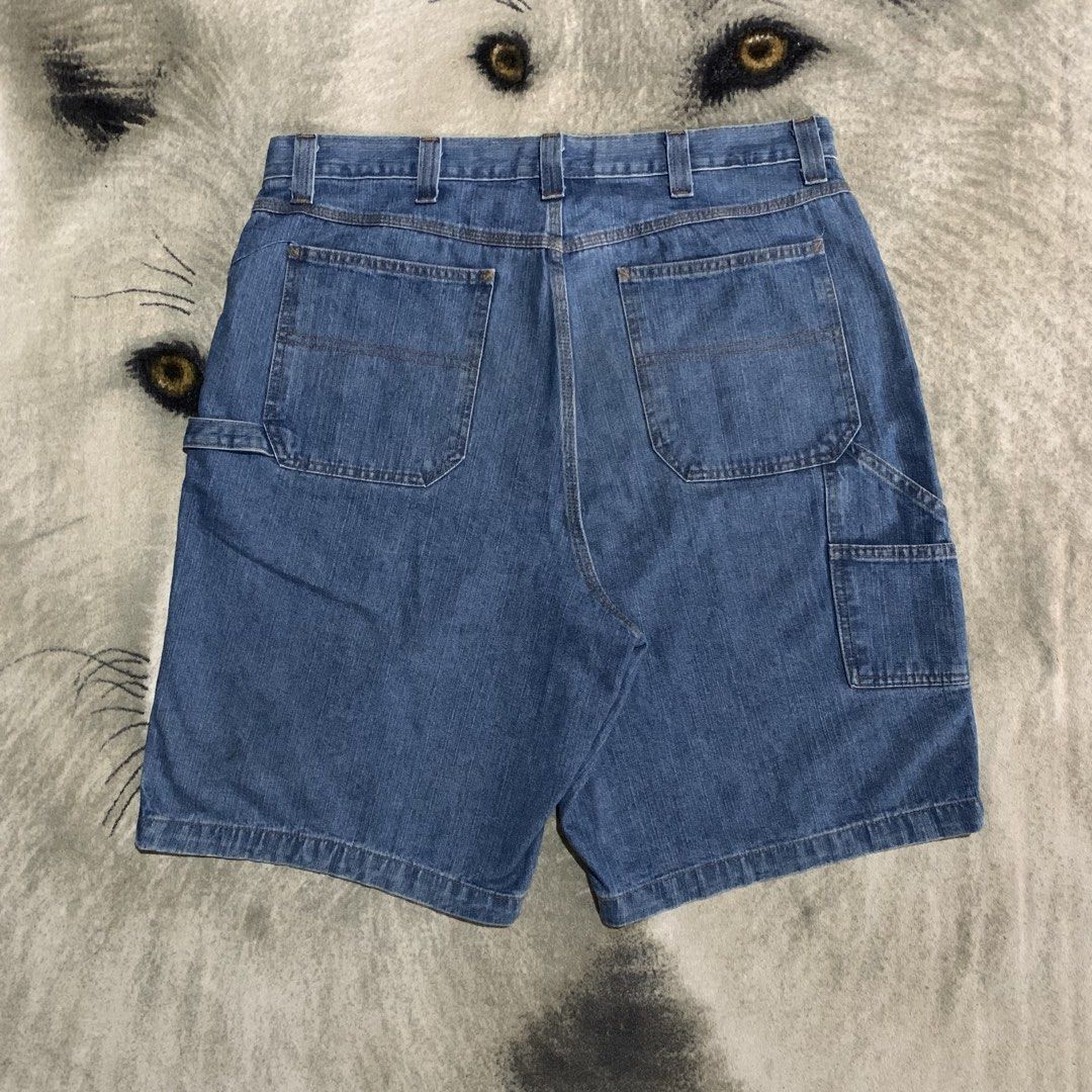 Saddlebred Denim Carpenter Shorts size 40 (Category: Shorts) located in Bulacan. Submitted by puronghustlin (Listing ID 1461360026, Image 1). Description: - Classic blue denim carpenter shorts - Features a utility loop and multiple pockets - Relaxed fit for comfortable everyday wear - Made from durable denim material - Belt loops on waistband - Button and zip fly closure -40x25.5.