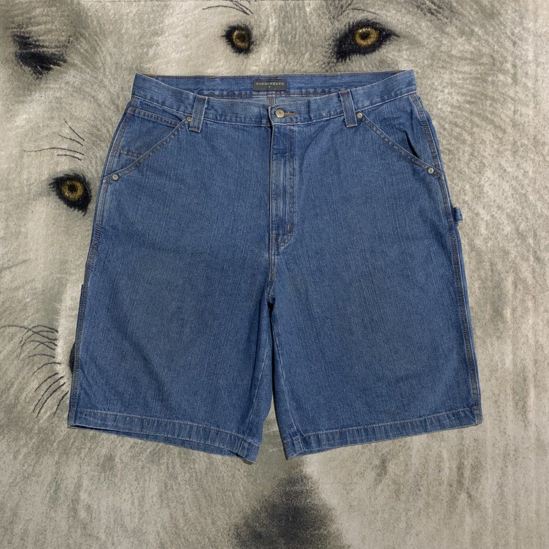 Saddlebred Denim Carpenter Shorts size 40 (Category: Shorts) located in Bulacan. Submitted by puronghustlin (Listing ID 1461360026, Image 2). Description: - Classic blue denim carpenter shorts - Features a utility loop and multiple pockets - Relaxed fit for comfortable everyday wear - Made from durable denim material - Belt loops on waistband - Button and zip fly closure -40x25.5.
