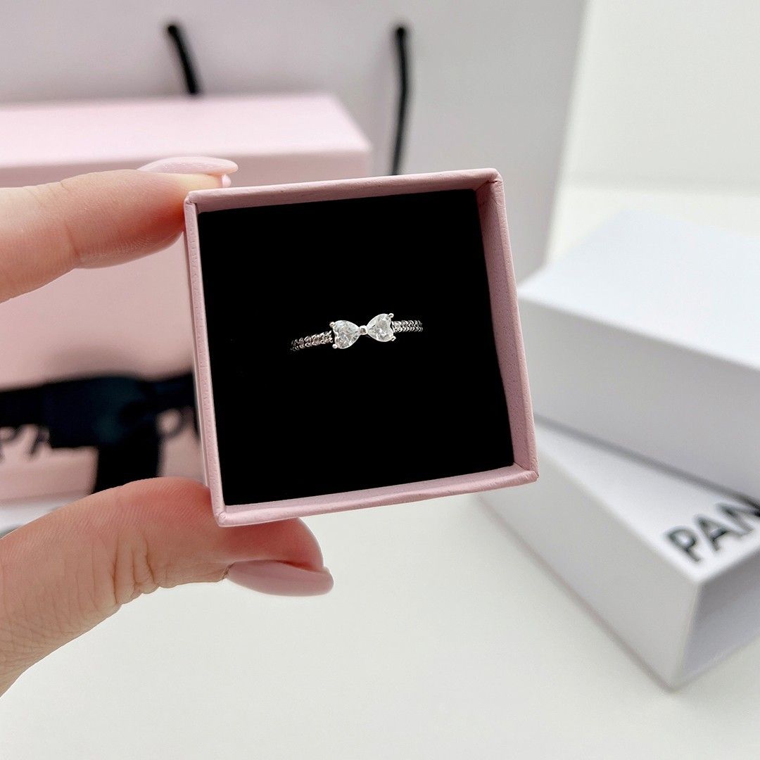 SALE❗Pandora Sparkling Bow Ring (Category: Rings) located in Manila. Submitted by badaloves_u (Listing ID 1465981166, Image 1). Description: - 💯 Authentic Pandora with Authenticity ALE marks - FREE Box and Paper bag 🛍️ - ✨ FREE Cleaning to any Pandora Store 🛵 LALAMOVE courier for same day delivery 🚚 J&T provincial courier.