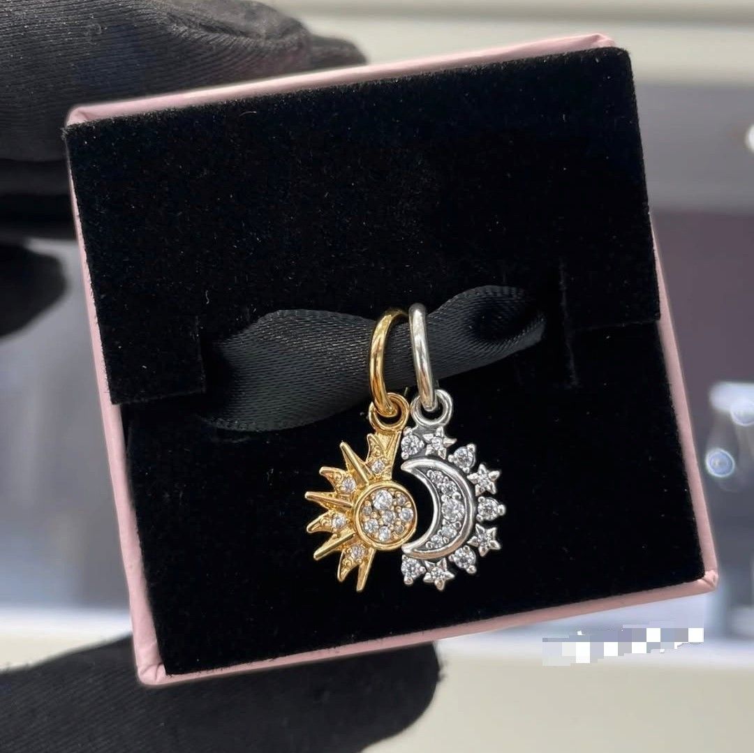 SALE❗Pandora Splittable Sun & Moon Dangle Charm (Category: Charms) located in Manila. Submitted by badaloves_u (Listing ID 1466014168, Image 1). Description: - 💯 Authentic Pandora with Authenticity ALE marks - FREE Box and Paper bag 🛍️ - ✨ FREE Cleaning to any Pandora Store 🛵 LALAMOVE courier for same day delivery 🚚 J&T provincial courier.