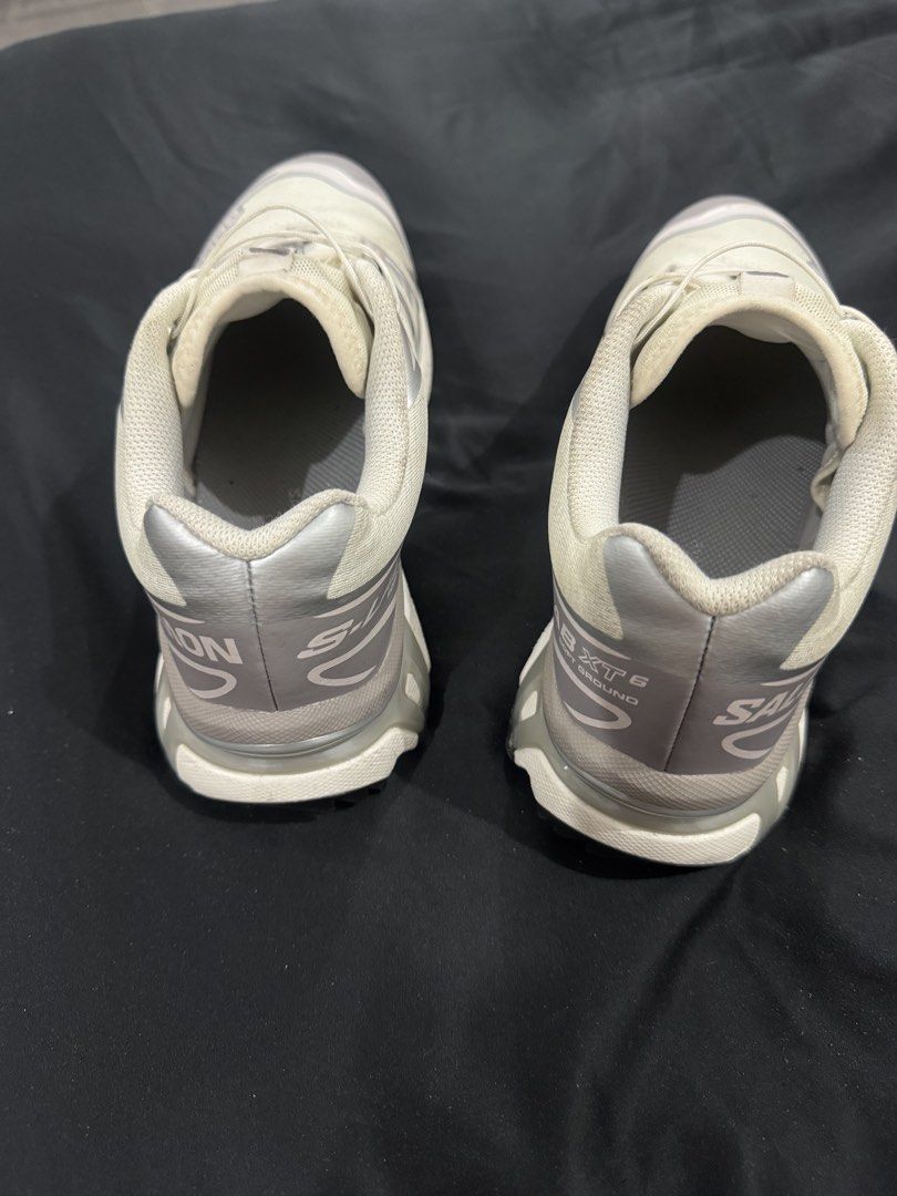 Salomon XT-6 (Category: Sneakers) located in Manila. Submitted by bryannnnnnnnnn (Listing ID 1466104806, Image 3). Description: - Brand/Model: Salomon S-Lab XT-6 - Colorway: Off-white and grey - Condition: Gently used with minimal wear on uppers and treads - Features: Quicklace system for fast and simple wear, cushioned sole, supportive fit - Ideal For: Trail running or comfortable daily walking - Status: Popular runners, grab them while availabl