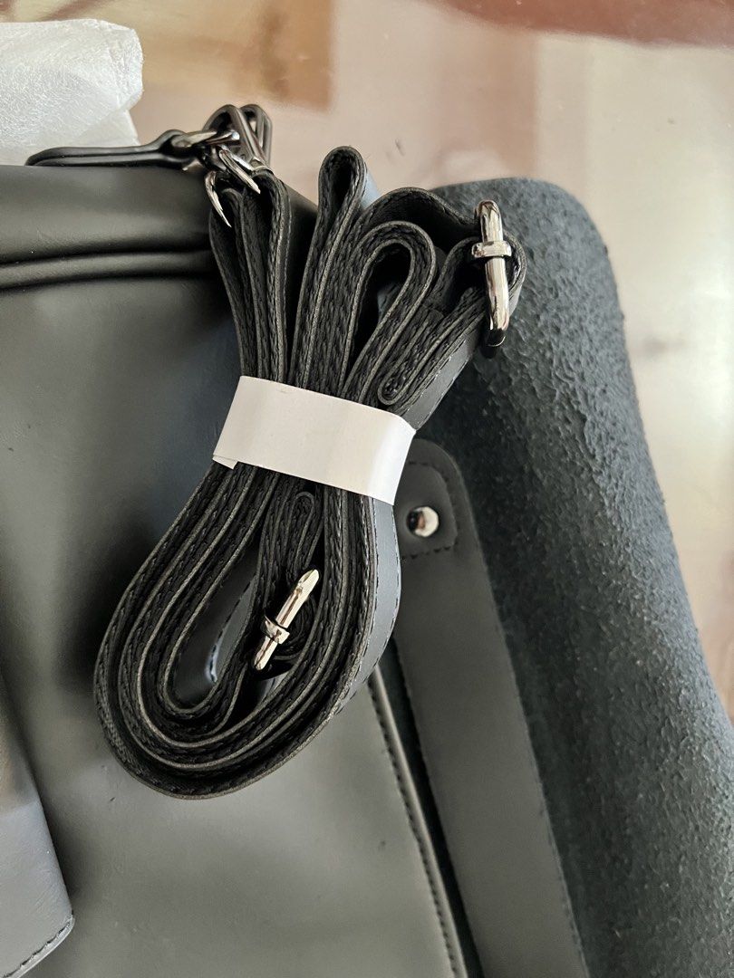 Salvatore Mann Black Sling / backpack New! 14"x 3" x 11" (Category: Sling Bags) located in Caloocan City. Submitted by annscorner (Listing ID 1466099190, Image 3). Description: - High-quality and durable material - Sleek and modern design as shown in pictures - Perfect for everyday functionality - made with leatherette material -converts from hand bag to sling bag to backpack RFS. given as a gift / decluttering.