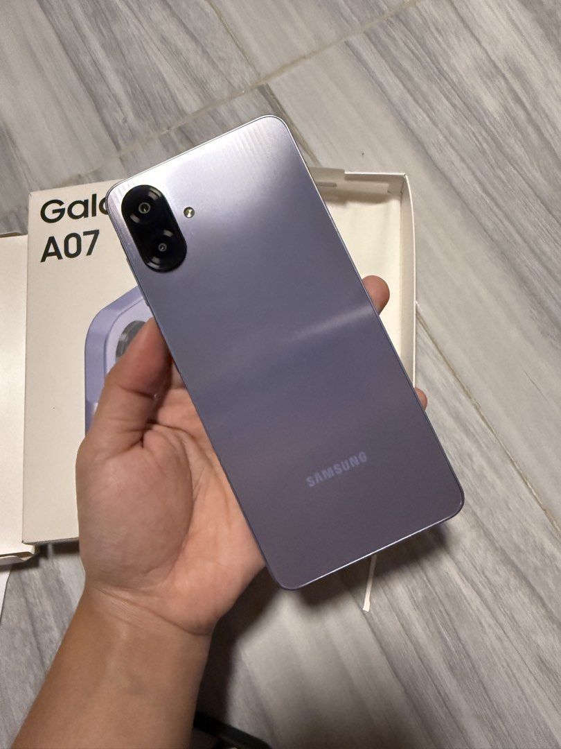 Samsung A07 Light Violet (Category: Samsung) located in Quezon City. Submitted by gooooodoffers (Listing ID 1466112027, Image 1). Description: No flaws Smooth like new Bought last July 2026 lang Rfs: Nagpalit ng model, rush need cash Comes with 2 cases With installed screen protector (matte privacy) Price is slightly nego Unit only, no charger. .
