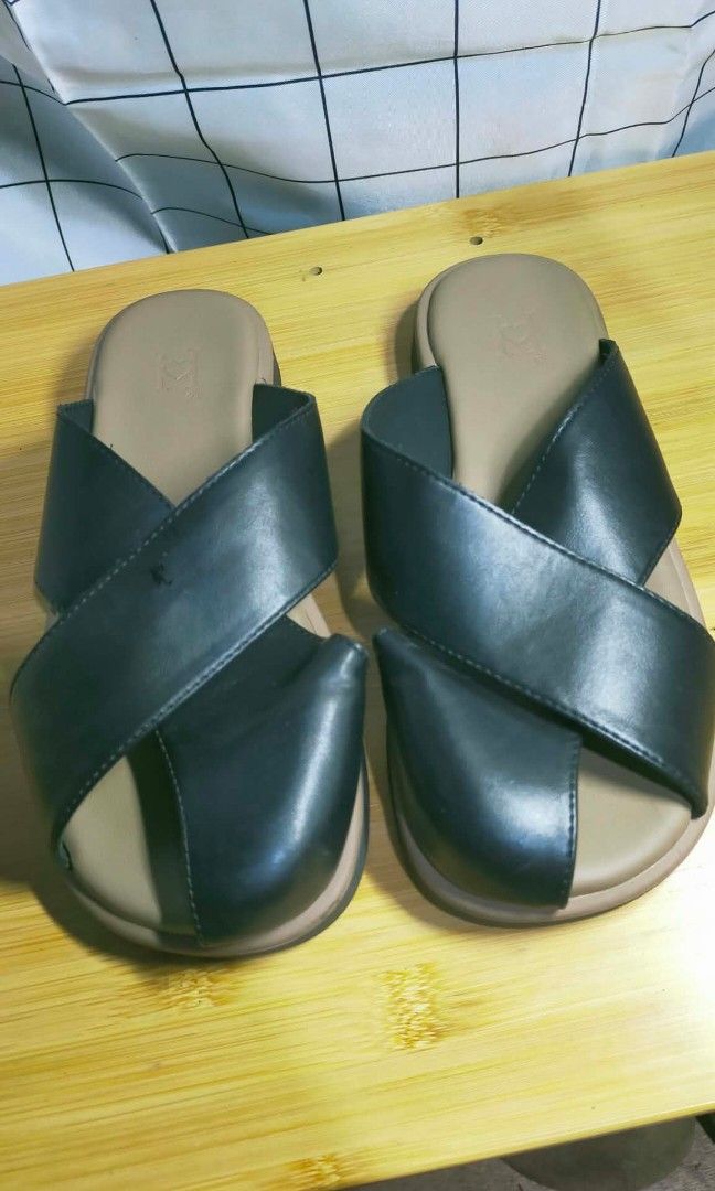 sandals for women (Category: Flats & Sandals) located in Caloocan City. Submitted by chani7878 (Listing ID 1466065676, Image 2). Description: black criss cross strap slides feature clean tan footbed for an easy and casual everyday use size 225 size us 5.5 good as new ilang beses lang ginamit preloved not ukay dm for more details manila area lang lalamove jnt or meet up.