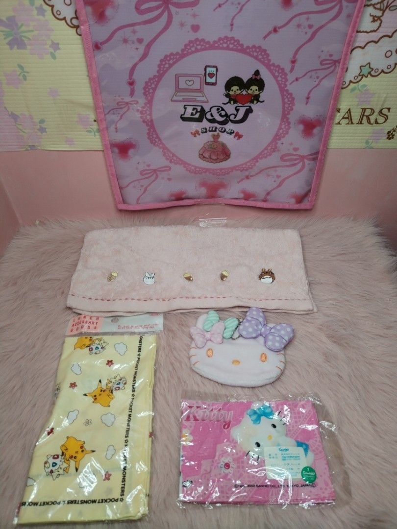 Sanrio and Pokemon character towel and accessory bundle (Category: Character Goods) located in Paombong. Submitted by eandj.shop (Listing ID 1466045239, Image 1). Description: 🎀 Sanrio Kitty plush tissue holder 🎀 Kitty pink patterned handkerchief 🎀 Pokemon yellow lunch cloth .