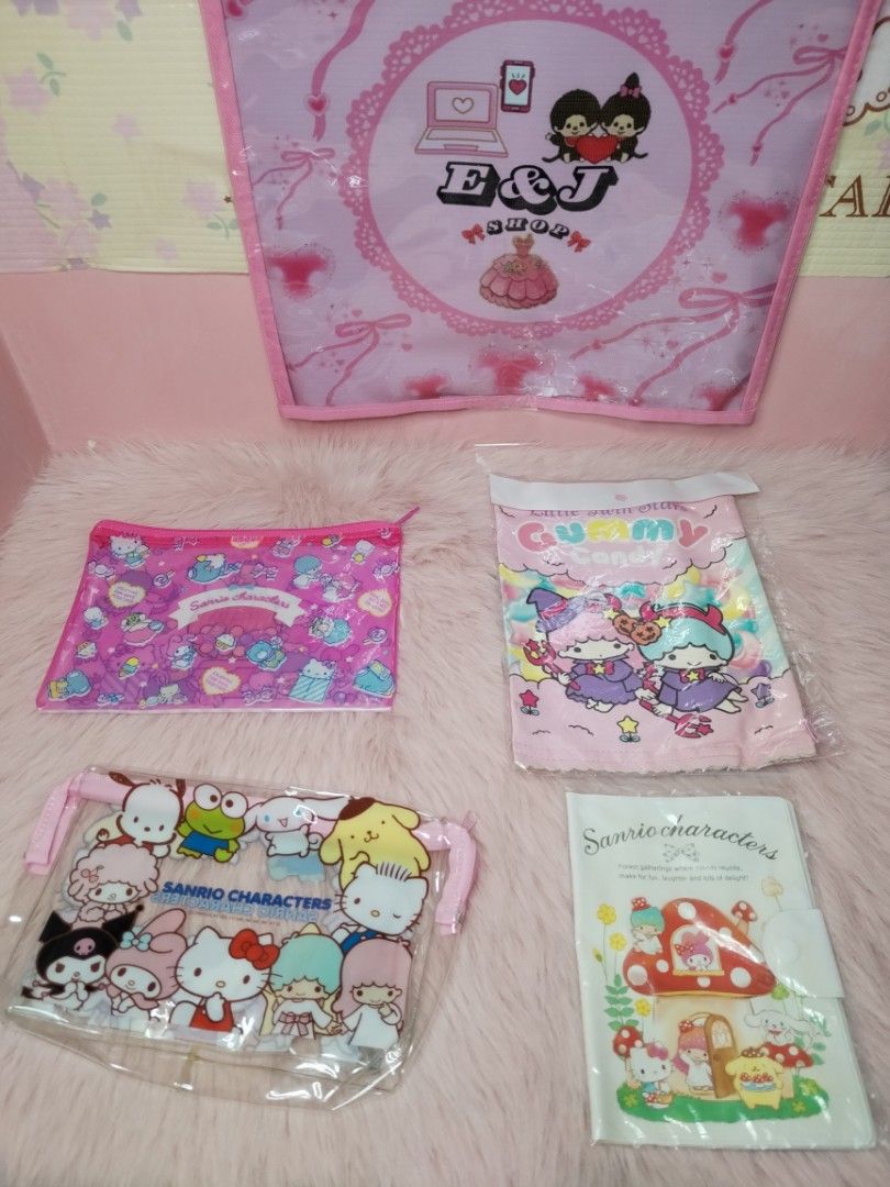 Sanrio Characters Assorted Pouches Bundle (Category: Stationery & School Supplies) located in Paombong. Submitted by eandj.shop (Listing ID 1466044692, Image 1). Description: 🎀 Sanrio bundle featuring 🎀 Clear PVC pouch with multiple characters ( Kitty, My Melody, Kuromi)🎀 Pink zippered pouch for everyday essentials 🎀 Little Twin Stars gummy candy themed pouch 🎀 Perfect gift for Sanrio fans of all ages.