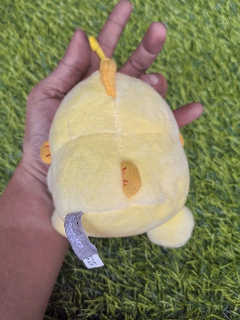 Sanrio Licensed Yellow Duck Character Plush Keychain (Category: Plushies & Soft Toys) located in Paranaque City. Submitted by furugiyafinds (Listing ID 1466035764, Image 2). Description: - Official Sanrio Licensed plush keychain - Adorable yellow bird design with embroidered facial details - Features a vibrant orange beak and matching feet - Equipped with a sturdy yellow plastic clip for easy hanging.